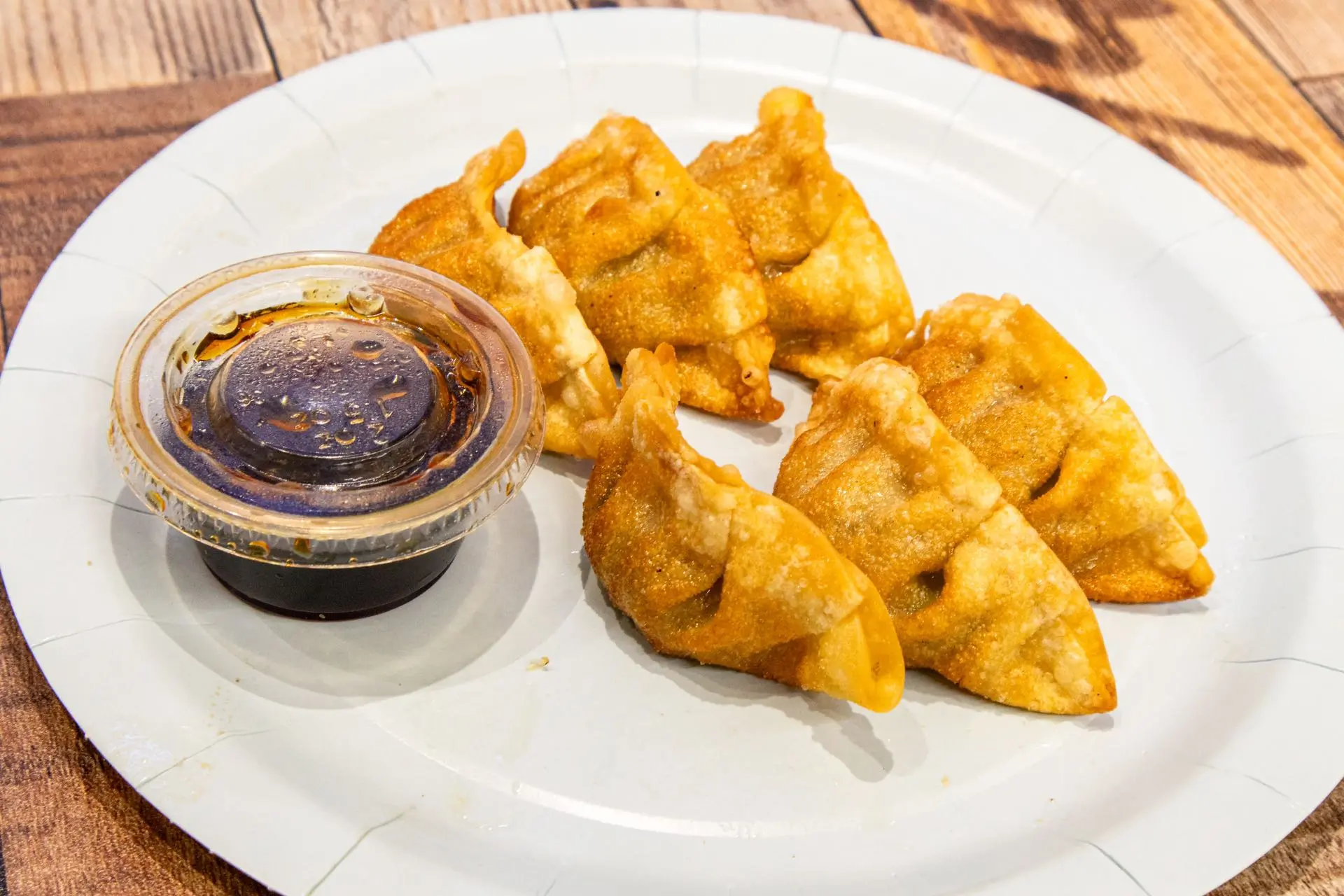 Fried pork gyoza with soy dipping sauce at Aaron Wings & Hibachi, a Hibachi & Wings Restaurant in Stockbridge